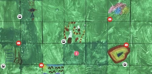 Lasten piirustus, jonka päälle on lisätty erilaisia merkkejä.